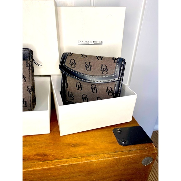 Dooney & Bourke Handbags - Dooney & Bourke, black leather and grey monogram wallet.